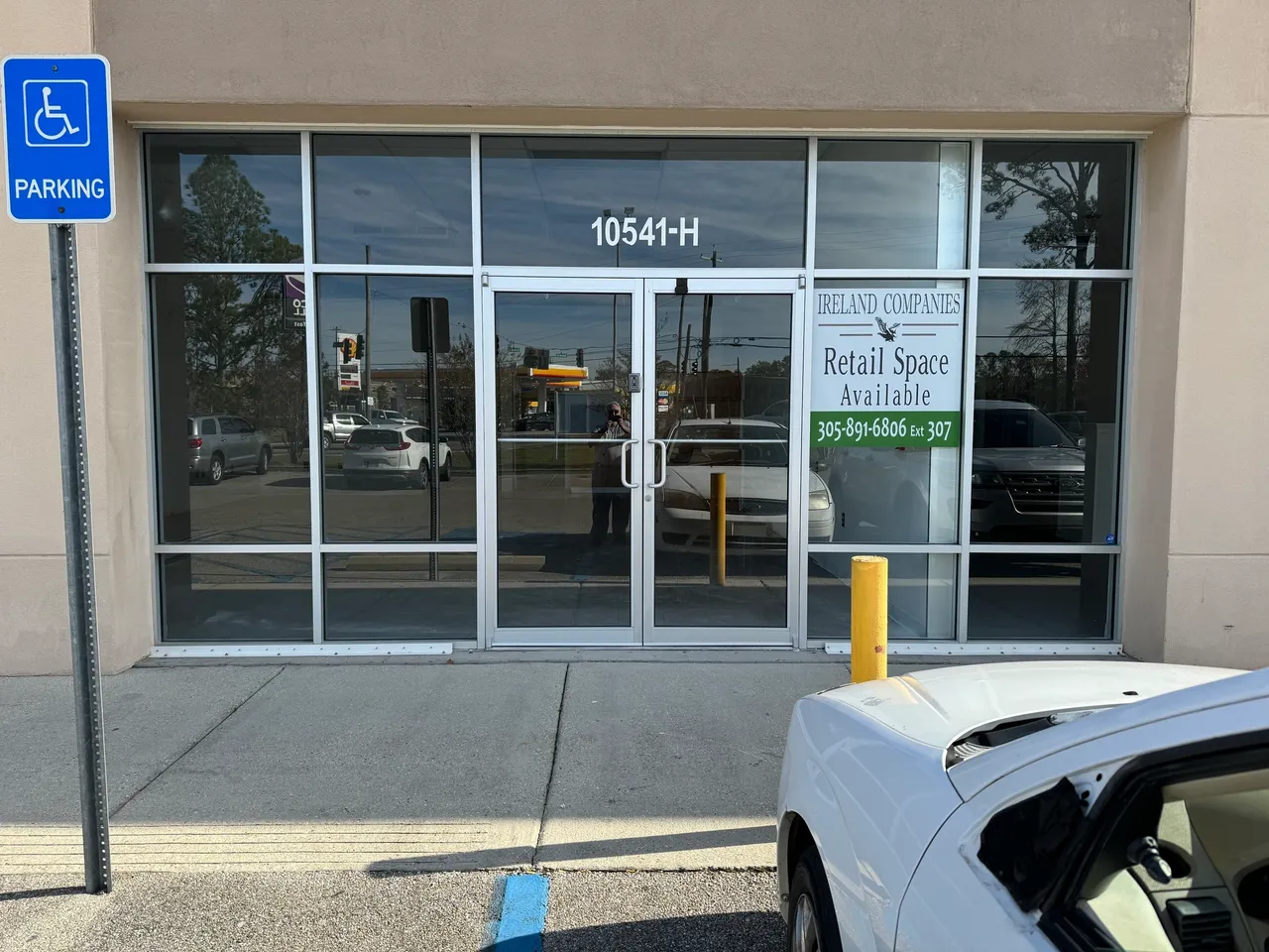 Retail space available sign on storefront window.
